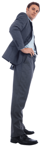 Confident Businessman in Formal Suit with Hands on Hips