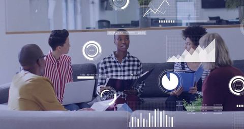 Team discussing analytics with data visualization in modern office