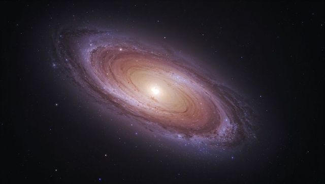 Tilted spiral galaxy rotating with bright core and dust lanes in deep space