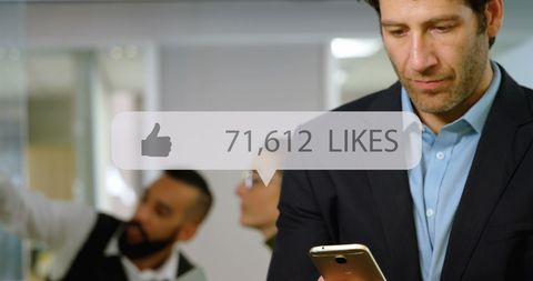 Businessman Growing Social Media Engagement at Office