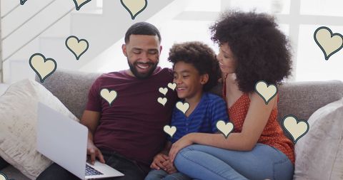 Happy Family Enjoying Time on Laptop with Social Media Influences