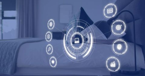 Digital Icons Display Over Person Using Laptop on Bed