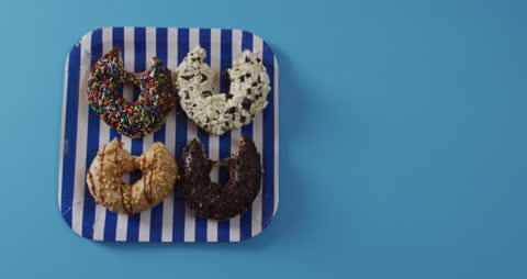 Array of Creative Donuts with Decorative Toppings