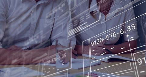 Collaborative analysts reviewing financial data with futuristic HUD overlay and notebooks