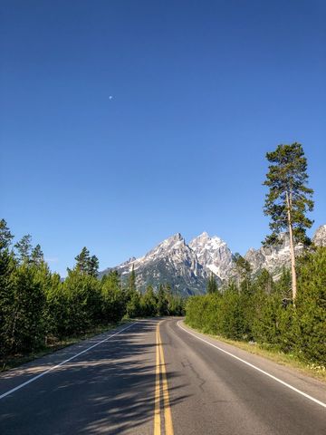 Scenic mountain road highway with clear skies