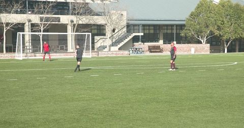 Soccer match focusing on teamwork and ball control skills