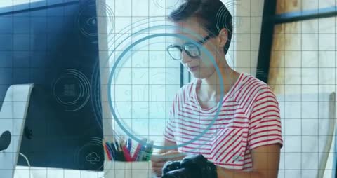 Woman Engaging with Data Security Interface in Modern Workspace