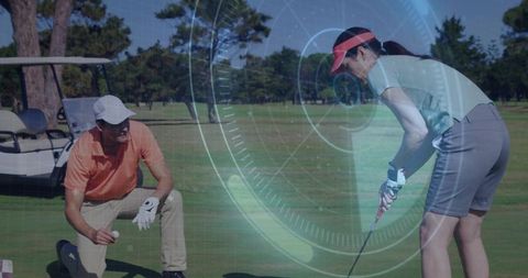 Golfers Analyzing Game using Digital Technology in Scenic Course