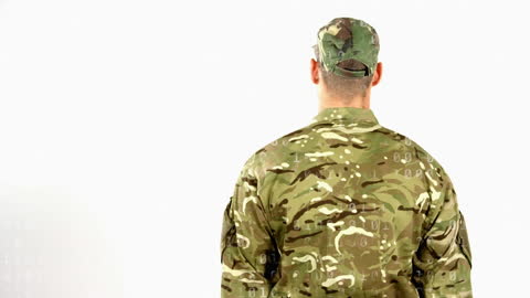 Soldier in CAMO Viewing Digital Data Processing