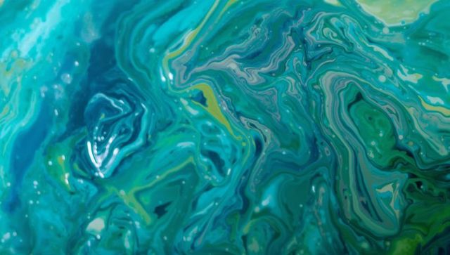 Dynamic abstraction with green-blue and yellow swirls