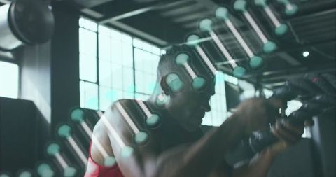 Athletic Man Battling Ropes with DNA Superimposed