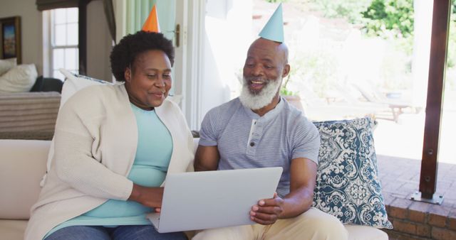 Senior African American Couple Celebrating with Video Call at Home - Download Free Stock Images Pikwizard.com