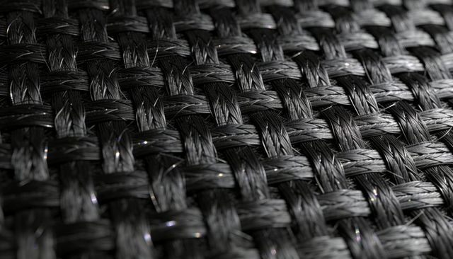 Macro Woven Carbon Fiber Texture with Glossy Specular Highlights