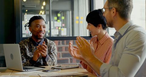 Team Applause During Business Meeting in Office - Download Free Stock Images Pikwizard.com