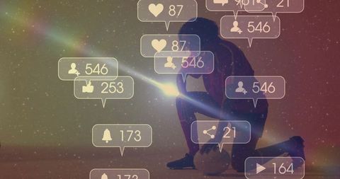 Athlete interacting with digital world through bright smartphone beam