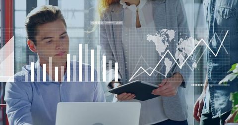 Professional Team Analyzing Digital Data in Modern Office