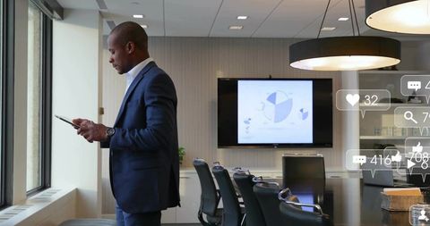 Corporate Executive Using Tablet with Social Media Icons