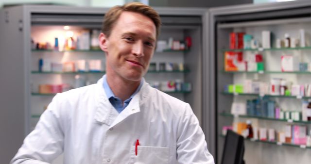 Smiling Pharmacist in White Coat at Pharmacy - Download Free Stock Images Pikwizard.com