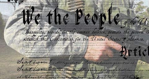 Soldier Holding Assault Rifle with Bandolier and Constitution Script Overlay