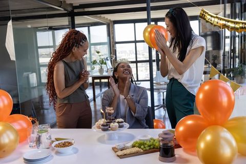 Office Birthday Celebration with Balloons and Cupcakes