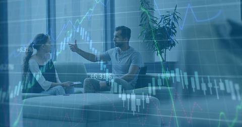 Office workers discuss stock market analysis