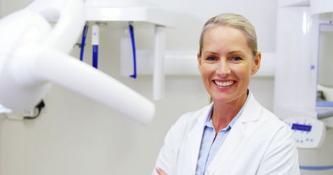 Confident Female Dentist in Modern Dental Clinic