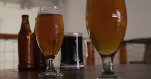 Refreshing Beer Variety on Rustic Pub Table - Download Free Stock Images Pikwizard.com