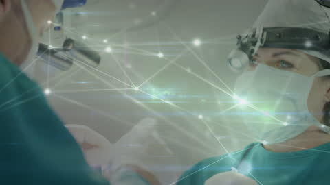 Surgeons Operating Amidst Digital Network Connections Integration