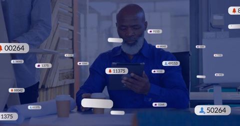 Senior professional using tablet with notification overlays for productivity and analytics