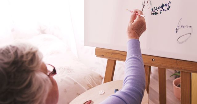 Senior Woman Painting On Canvas In Bright Studio - Download Free Stock Images Pikwizard.com