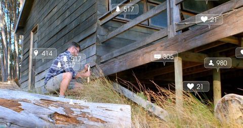 Handyman Repairing Rustic Cabin with Social Media Engagement Icons