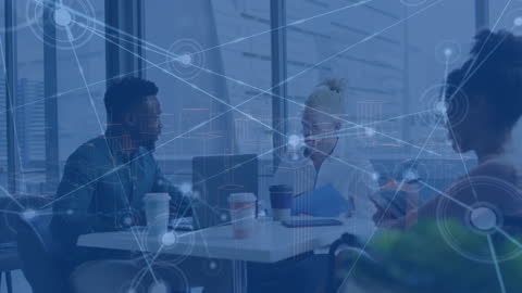 Diverse Professionals Collaborating in Tech-Driven Office Environment