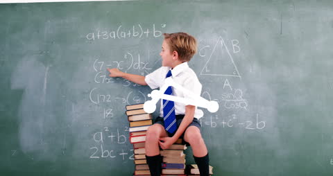 Young Boy Learning Mathematics in Classroom Concept
