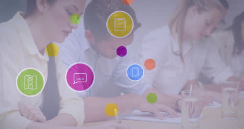 Network Icons Overlaying Business Meeting Educational Setting