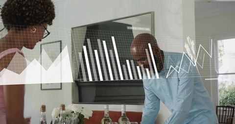 Couple discussing dinner plans while viewing AR data charts over wine bottles and glasses