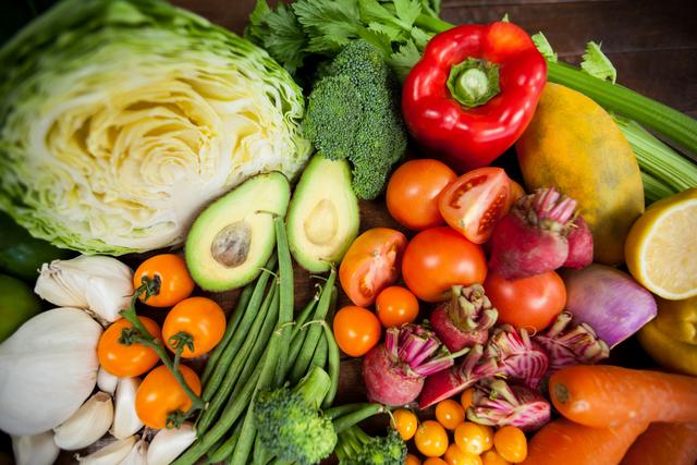 This vibrant image of fresh vegetables can be used for promoting healthy eating, diet plans, organic produce, and vegetarian or vegan lifestyles. Ideal for use in food blogs, nutrition websites, recipe books, and wellness magazines.