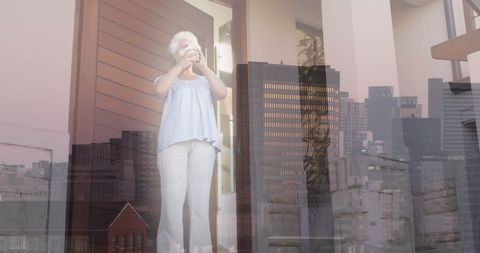 Elderly Woman Enjoying Coffee with Urban Cityscape Overlay