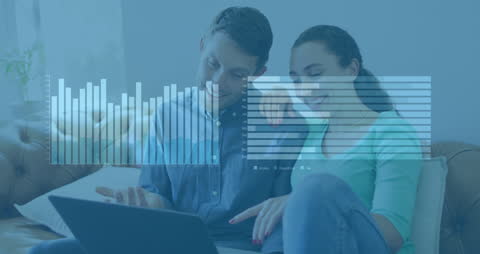 Couple Analyzing Laptop Data Visualizations Home Office