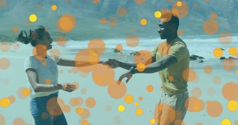Romantic Couple Dancing on Beach with Bokeh Lit Atmosphere
