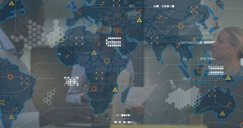 Business team collaborating over augmented reality map overlay for strategic analytics