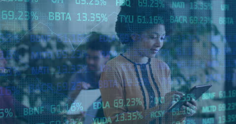 Businesswoman Engaging with Financial Data Overlay in Modern Workplace