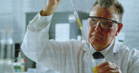 senior scientist examining test tube, chemical formula overlays - Download Free Stock Images Pikwizard.com