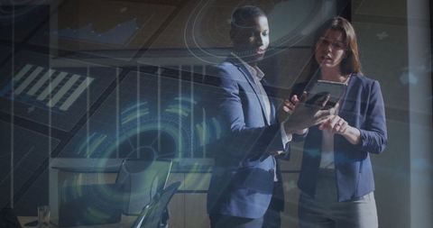 Business professionals analyze data with digital interface