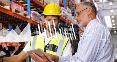 Warehouse professionals analyzing data with technology interface