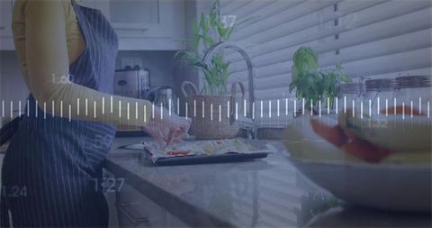 Chef Arranging Fresh Vegetables on Kitchen Countertop