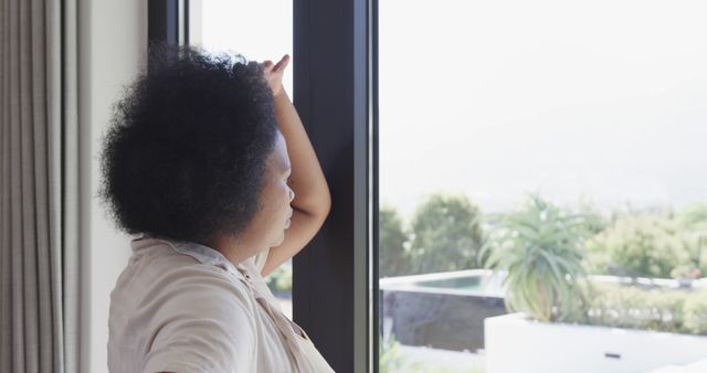 Woman Standing by Window Relaxing at Home - Download Free Stock Images Pikwizard.com