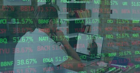 Businessman Analyzing Financial Data on Laptop Reflected with Stock Tickers