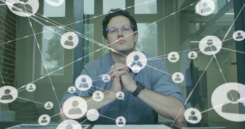 Businessman Engaging in Virtual Global Networking