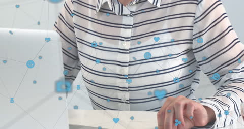 Woman Using Laptop Defined by Digital Networks and Icons