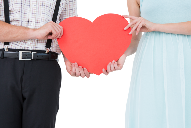 Couple Holding Red Heart Card on Transparent Background - Download Free Stock Videos Pikwizard.com